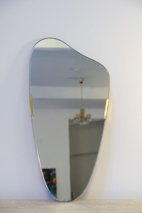 Extravagant mid-century asymmetric brass-clip wall mirror