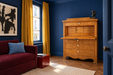 Biedermeier writing secretaire featuring clean architectural lines and a beautiful honey-toned veneer surface.